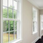 double hung windows with a white trim in a home