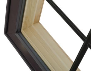 Corner of a black fiberglass window frame.