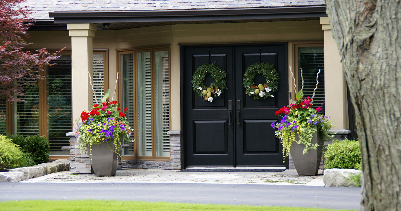 solid black front doors with picture windows on each side