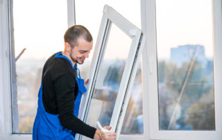 Professional master at repair and installation of windows, at work